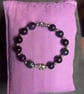 Handmade bracelet, 16cm. Purple, green & black with elephant charm. 