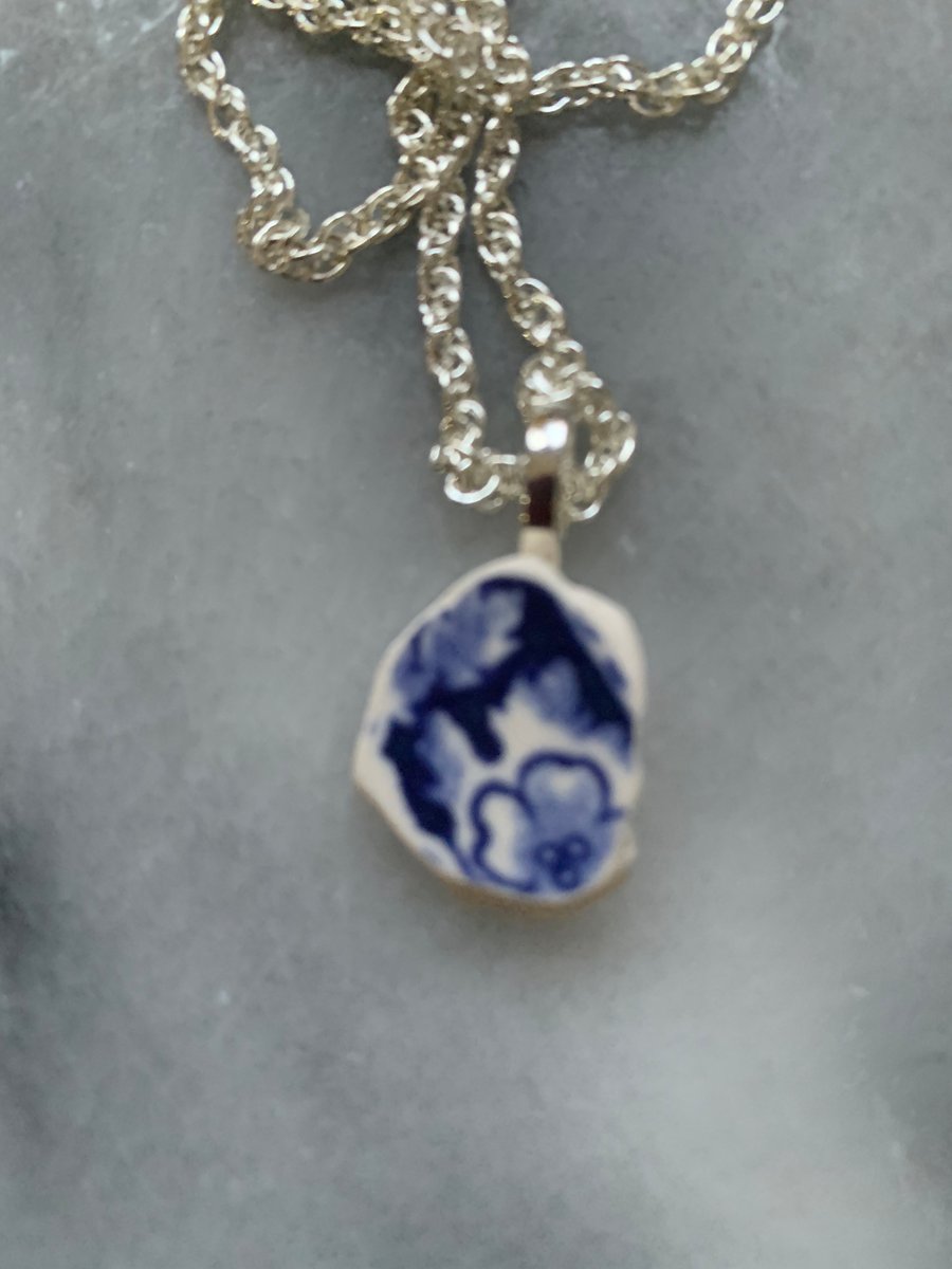 Silver plate and  blue & white sea pottery pendant