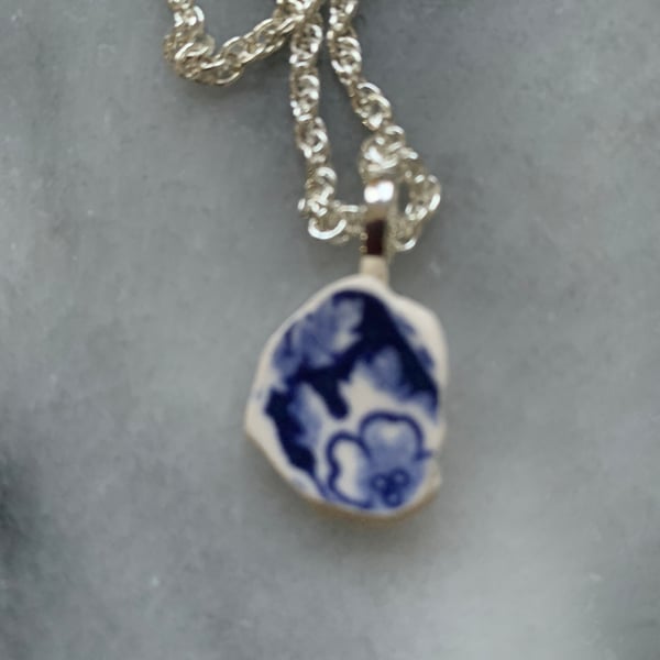 Silver plate and  blue & white sea pottery pendant