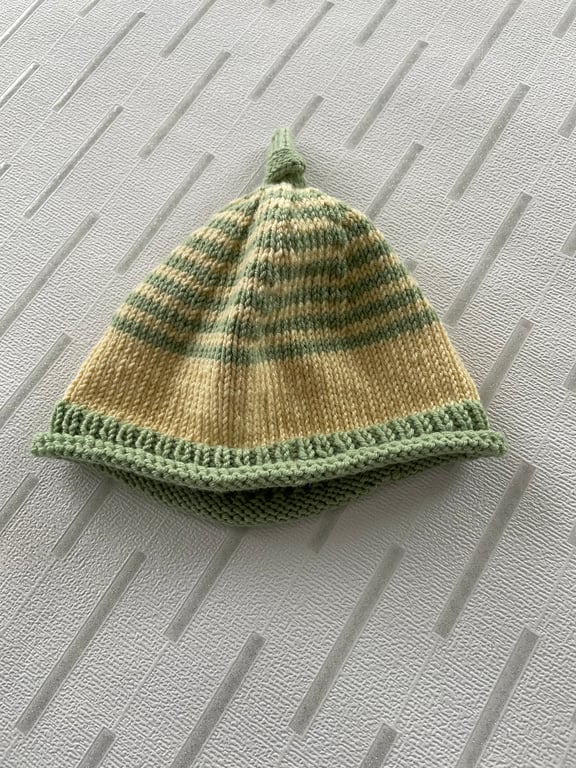 Yellow and green striped baby hat