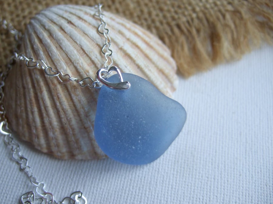 Scottish Ocean blue sea glass pendant on heart bail, blue curved shaped