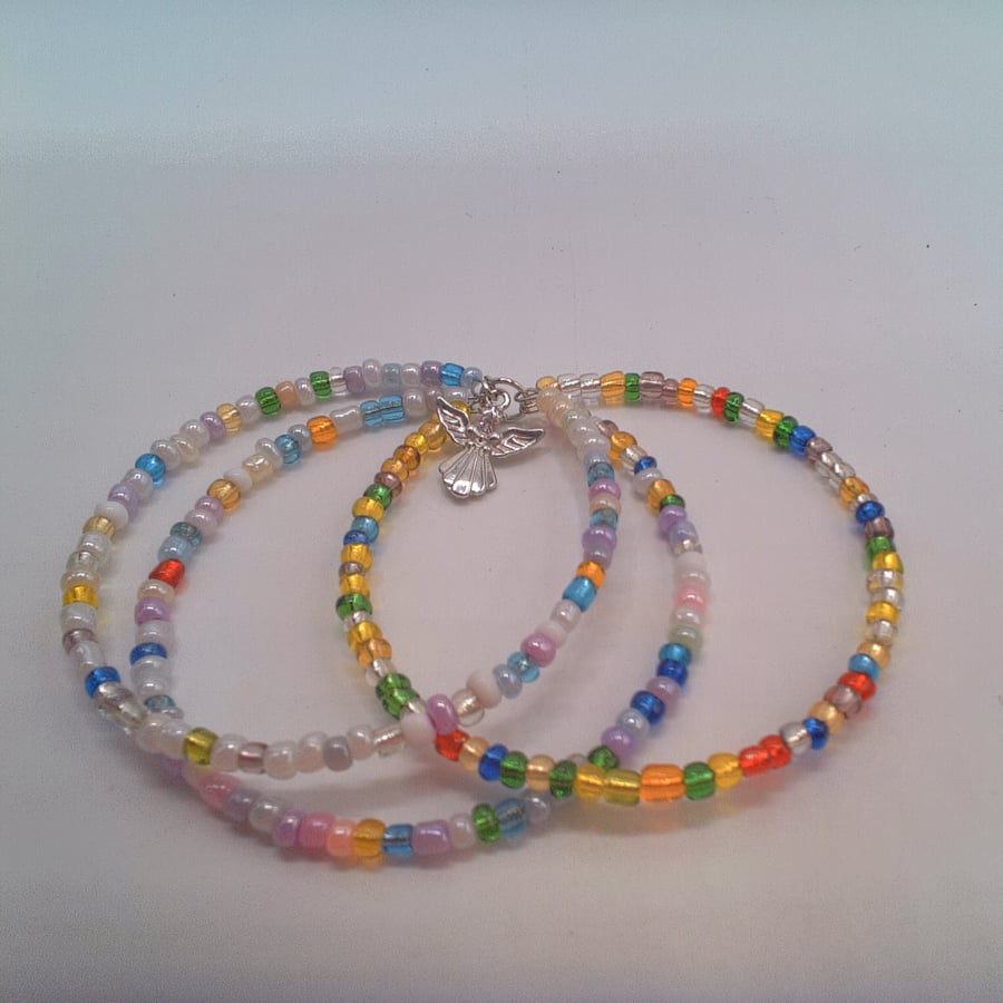 Set of 3 Stacking Memory Wire Cuff Bracelets with a Silver Plated Angel Charm