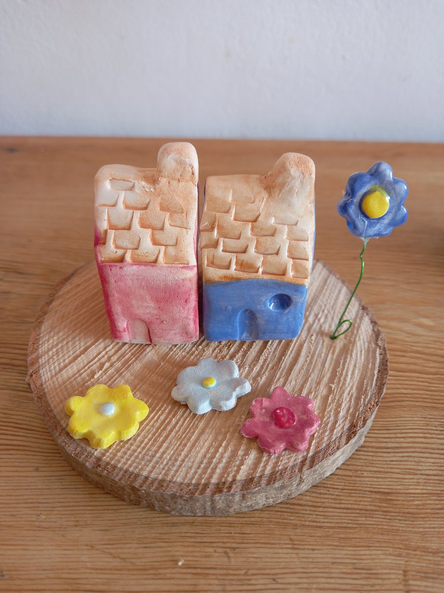 clay cottages with flower garden