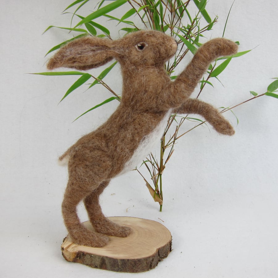 Needle felted model boxing hare, woollen sculpture