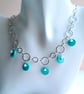 Turquoise & Shell Pearl Multi Charm Drop Fancy Silver Circle Chain Necklace Set - Image 1