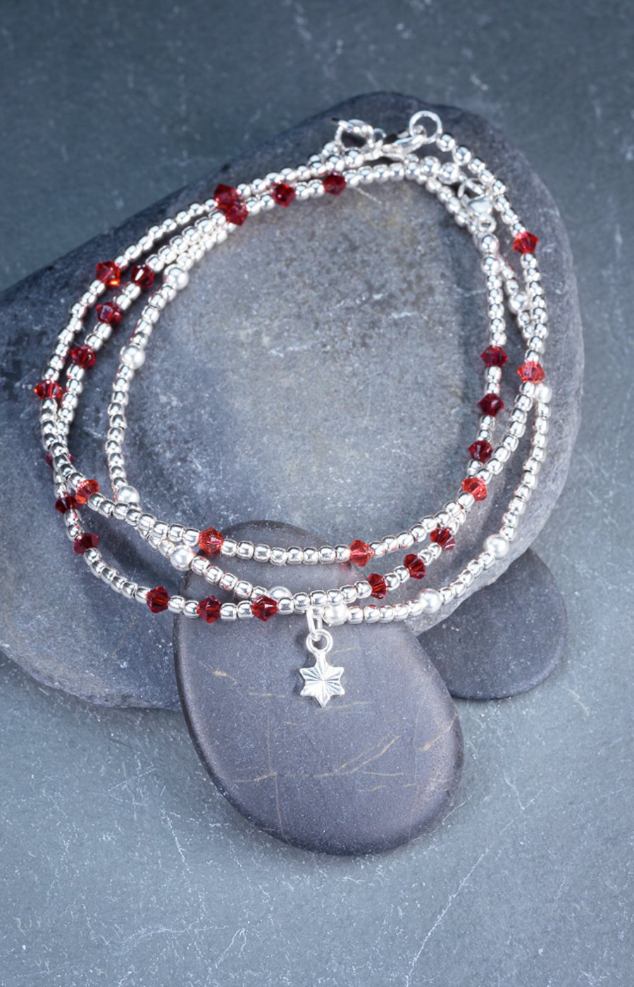Bracelets Sterling silver with red swarovski and star charm 