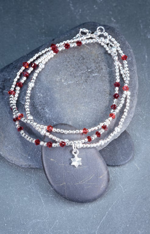 Bracelets Sterling silver with red swarovski and star charm 