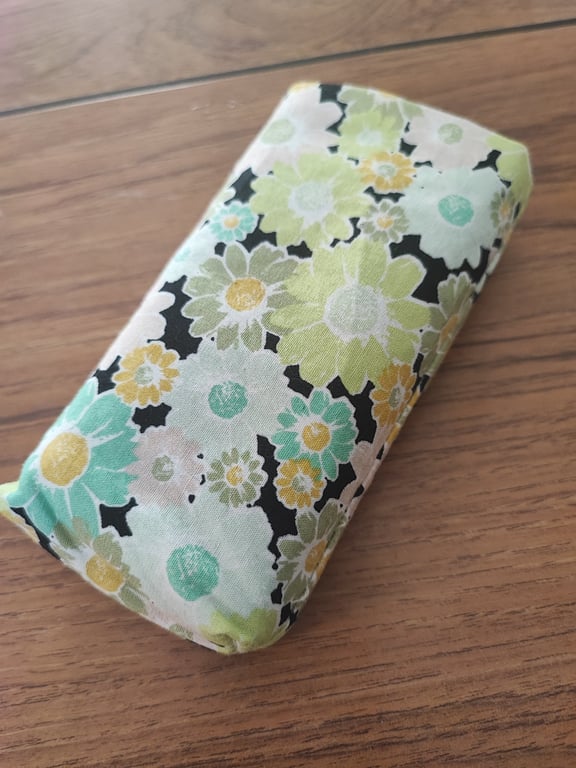 Tissue Holder Green and Yellow Flowers on black background