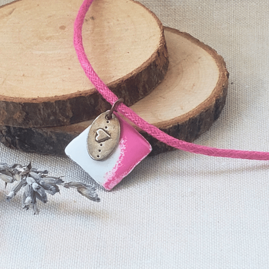 Small enamelled pink and white heart pendant