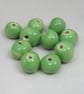 10 Small Apple Green Glazed Clay Beads - Image 4