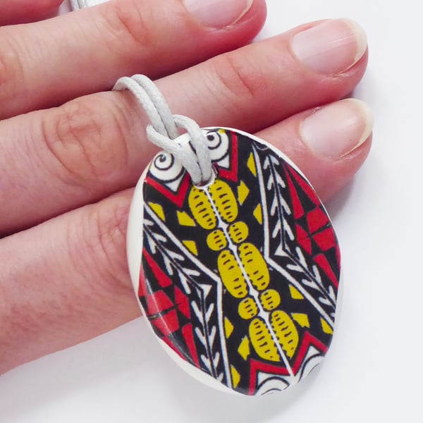 Red Black and Yellow Oval Ceramic Pendant on Grey Cord with Lobster Clasp