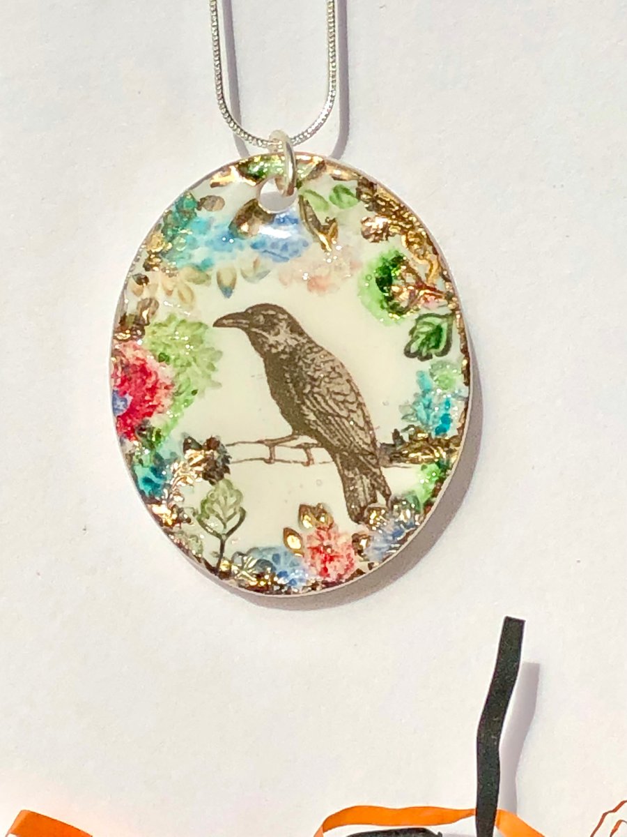 Beautiful Raven , Handcrafted, hand painted pendant 