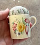 Vintage Susie Cooper coffee cup pincushion with embroidered linen - Image 4