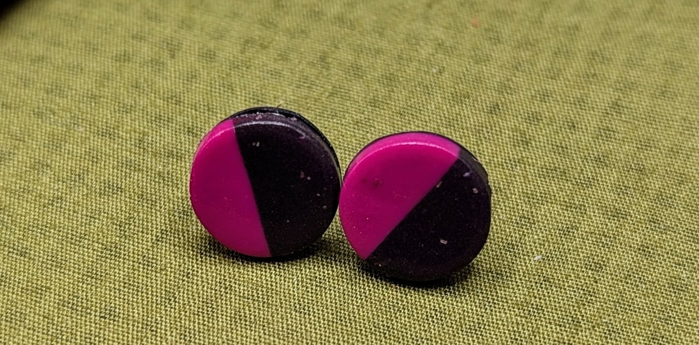 Magenta and black stud earrings