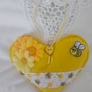 Spring time yellow felt hanging heart