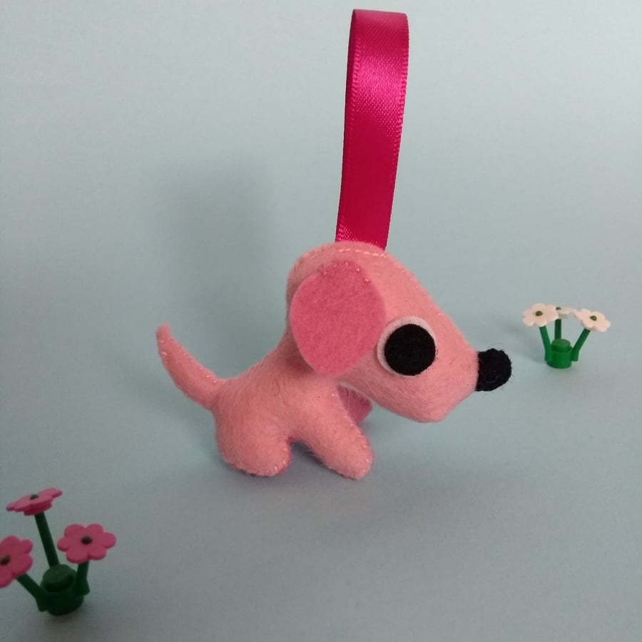 Pink hanging dog ornament