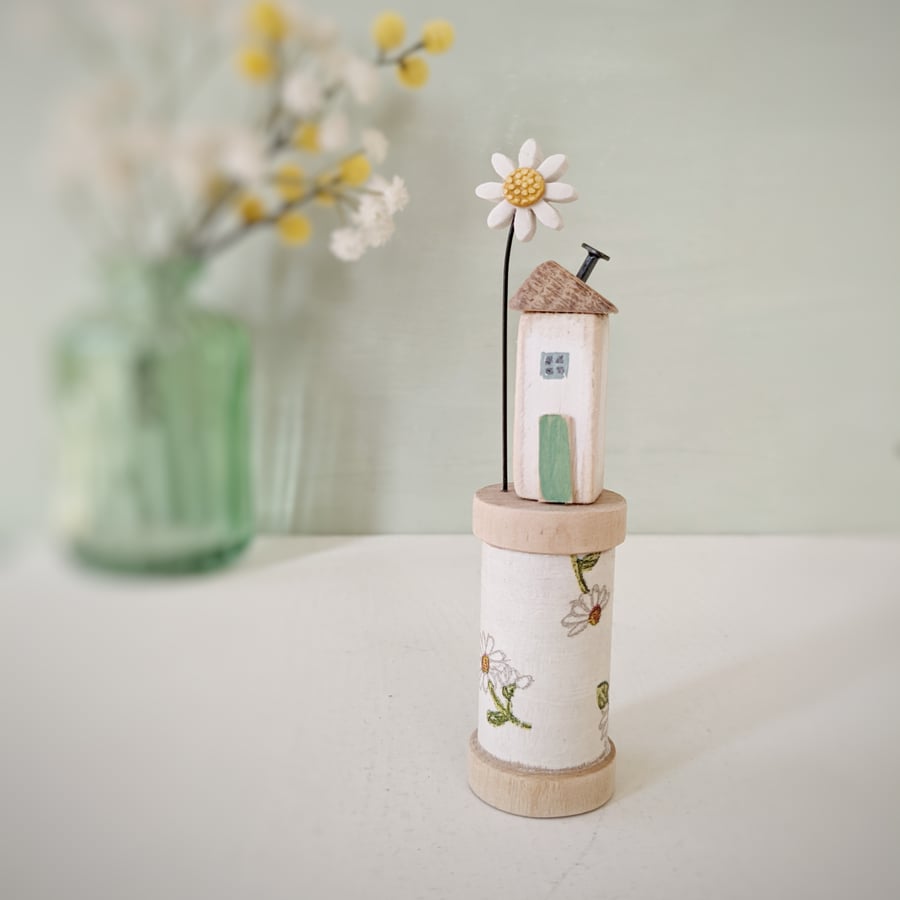 Wooden House on a Floral Bobbin with Clay Daisy