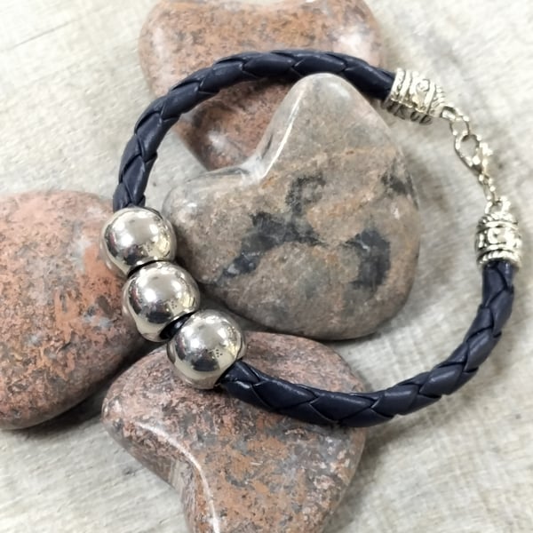 Dark blue plated leather bracelet with silver beads