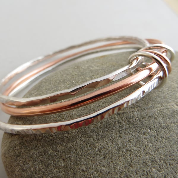 Silver and copper bangle set, Set of three bangles