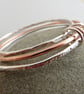 Silver and copper bangle set, Set of three bangles - Image 1