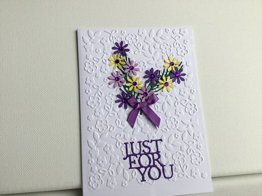 Pretty bouquet of flowers embossed 'just for you' card. CC410