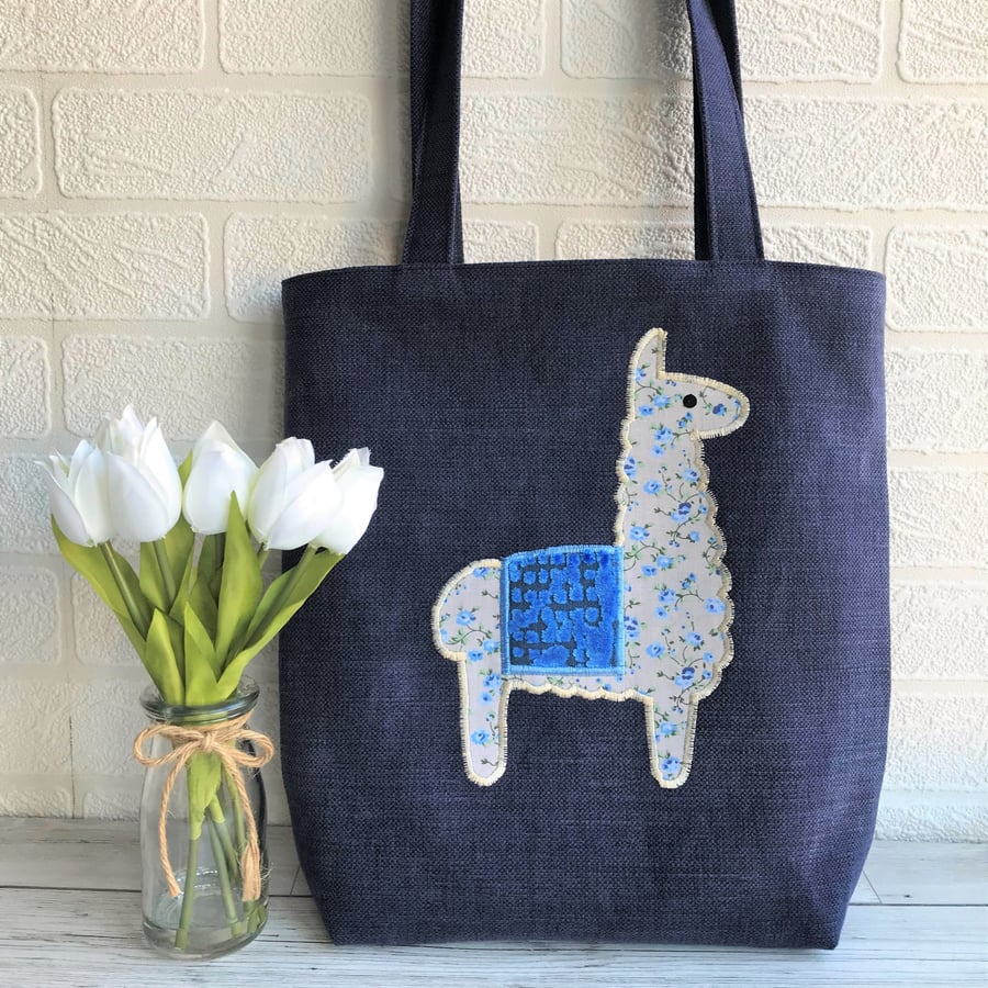 Llama tote bag in dark blue with ditsy floral llama and velvet textured blanket