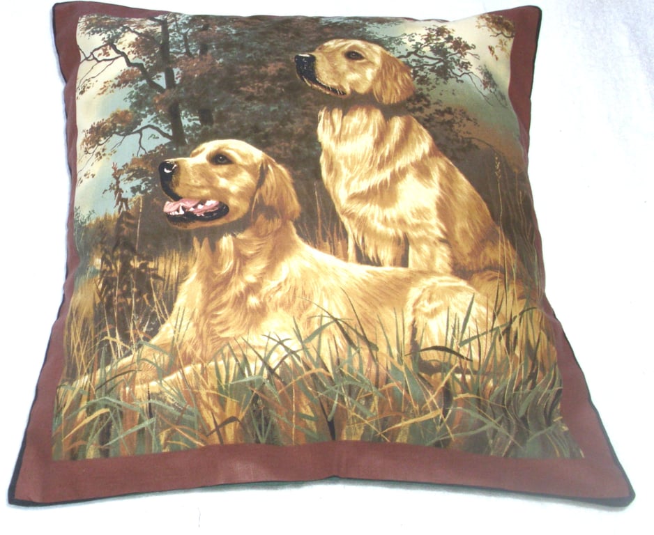 Two golden retrievers ready and waiting cushion