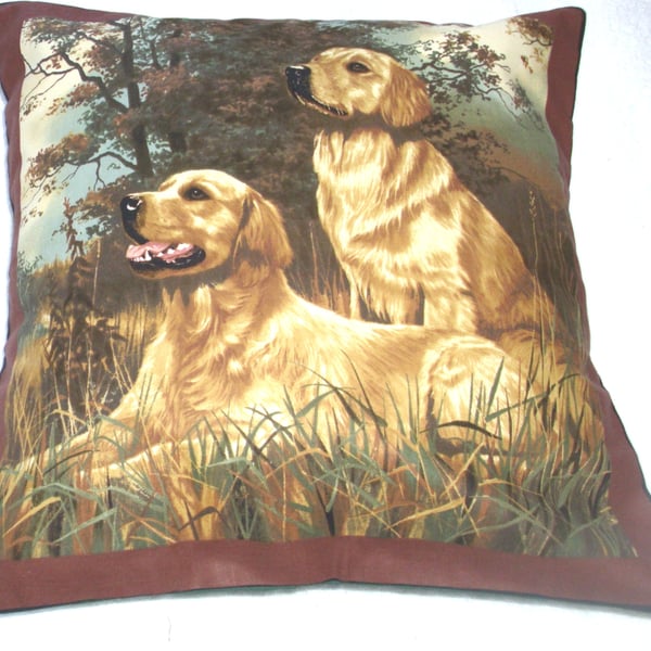 Two golden retrievers ready and waiting cushion