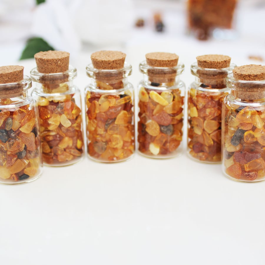 Cute little glass bottle filled with genuine Baltic Amber makes beautifully uniq