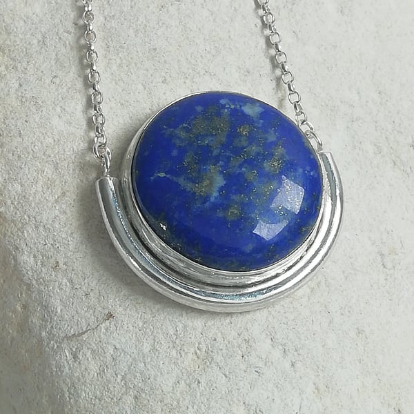 Lapis Cabochon in a Silver Semi Circle Necklace
