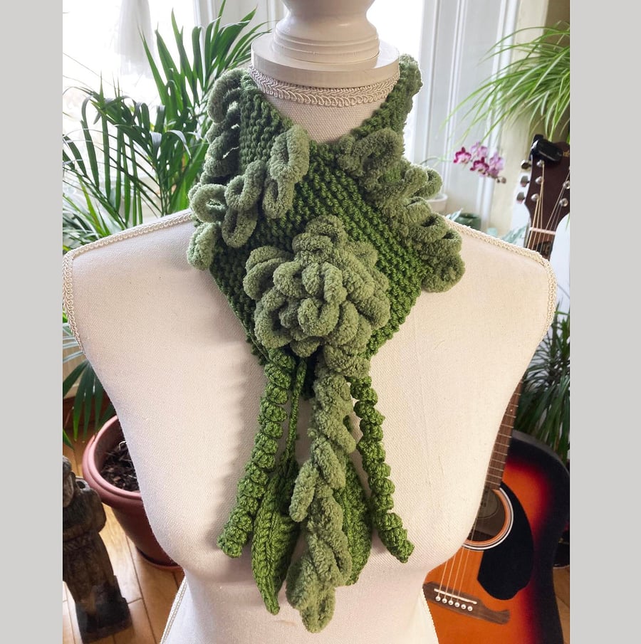 Chunky crochet green neck wrap with crochet green flowers