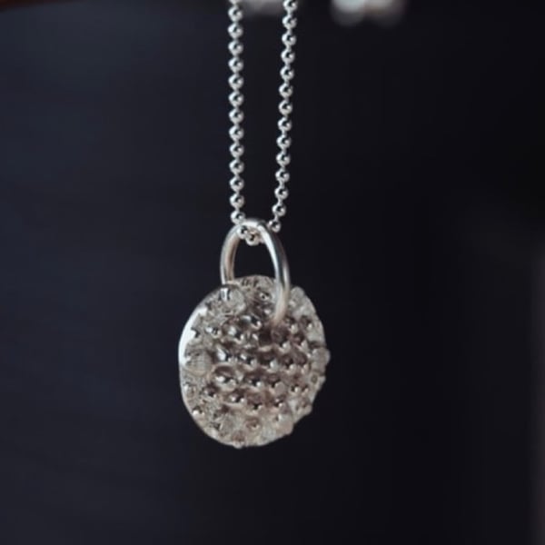 Handcrafted silver natural textured pendant