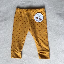 Age 1 year, leggings - ochre star