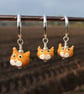 Tiny Glass Cat Stitch Marker - Ginger kitty - Image 1