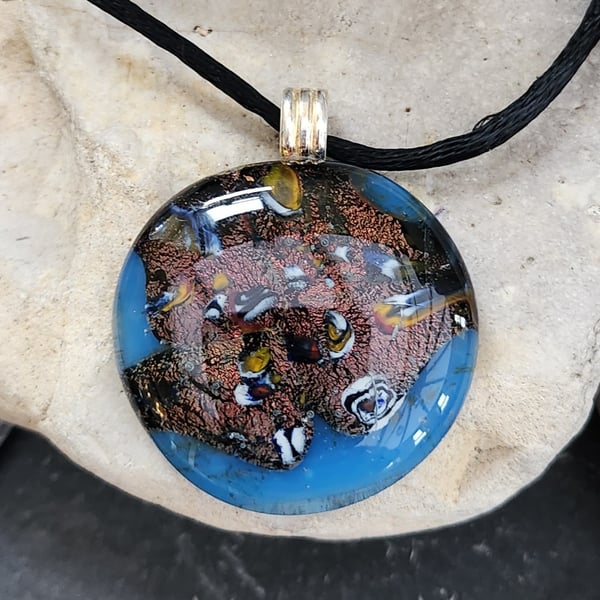 Blue glass pendant with crushed millefiori 