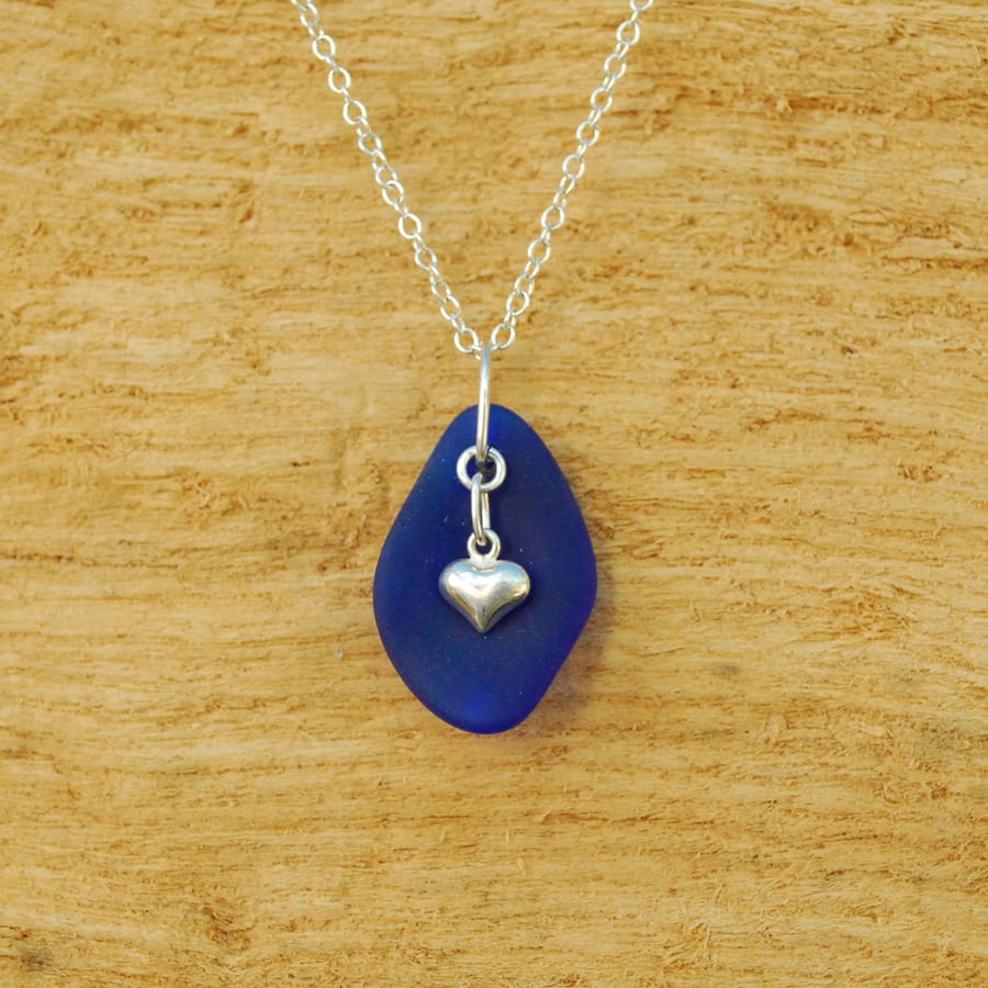 Blue beach glass pendant with heart charm
