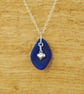 Blue beach glass pendant with heart charm - Image 1