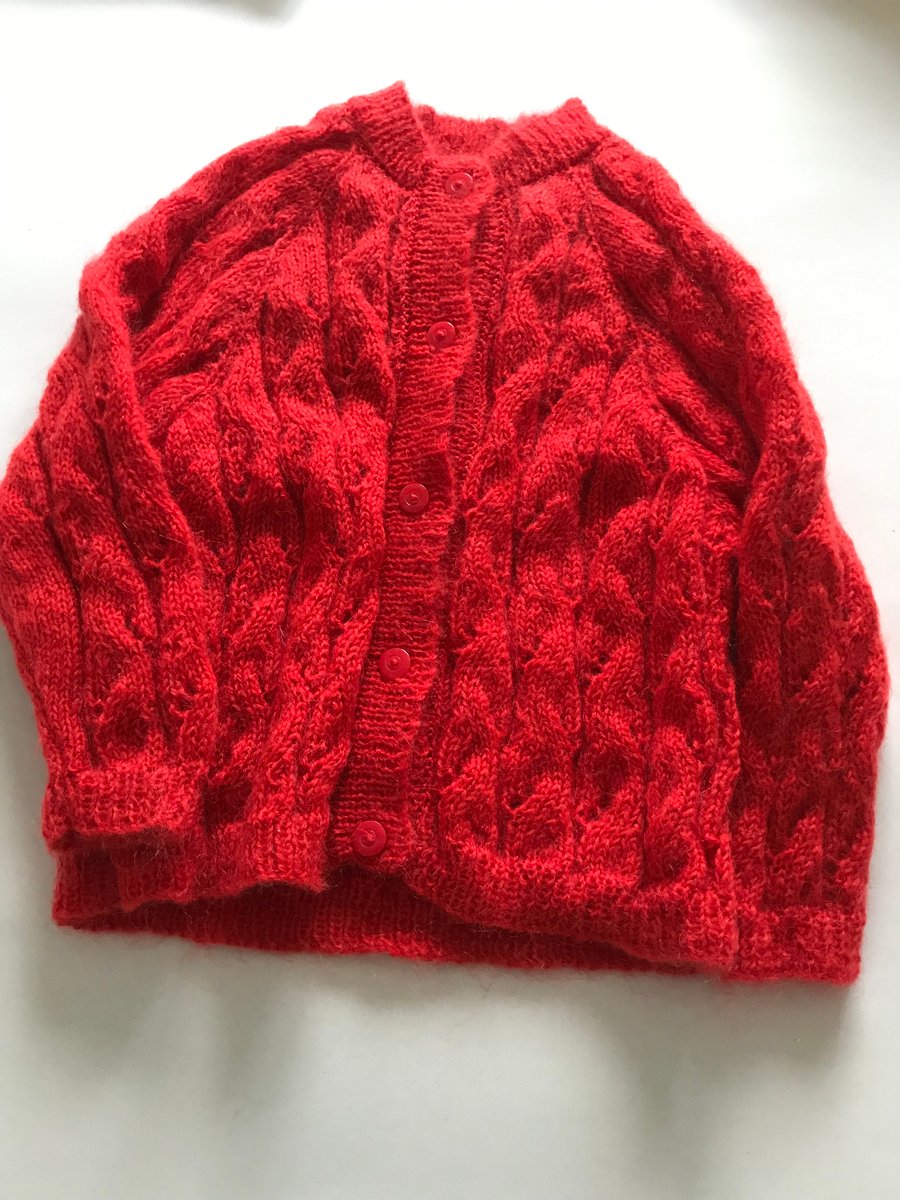 Hand knitted child's cardigan