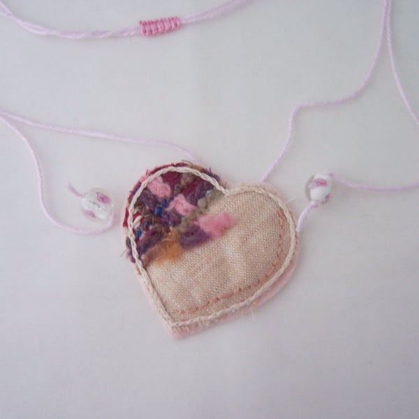 Embroidered love heart textile necklace 