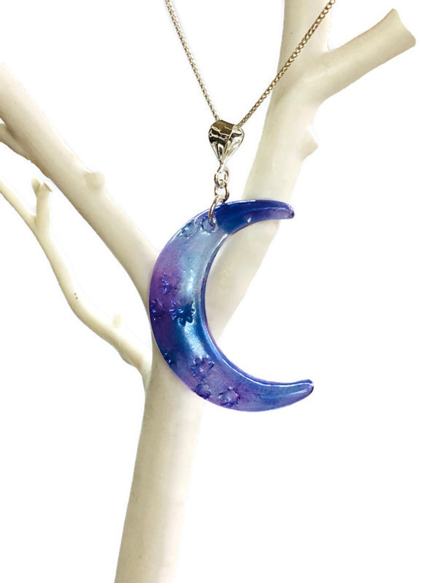 Blue and purple moon pendant and chain.