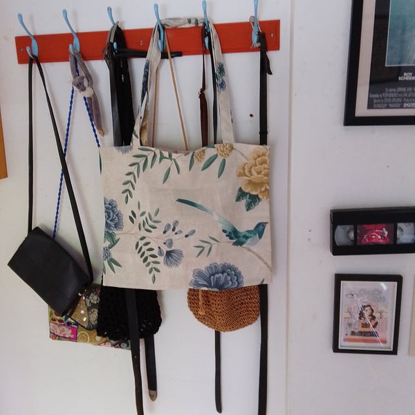 Tote bag in medium weight cream fabric with bird and flower design