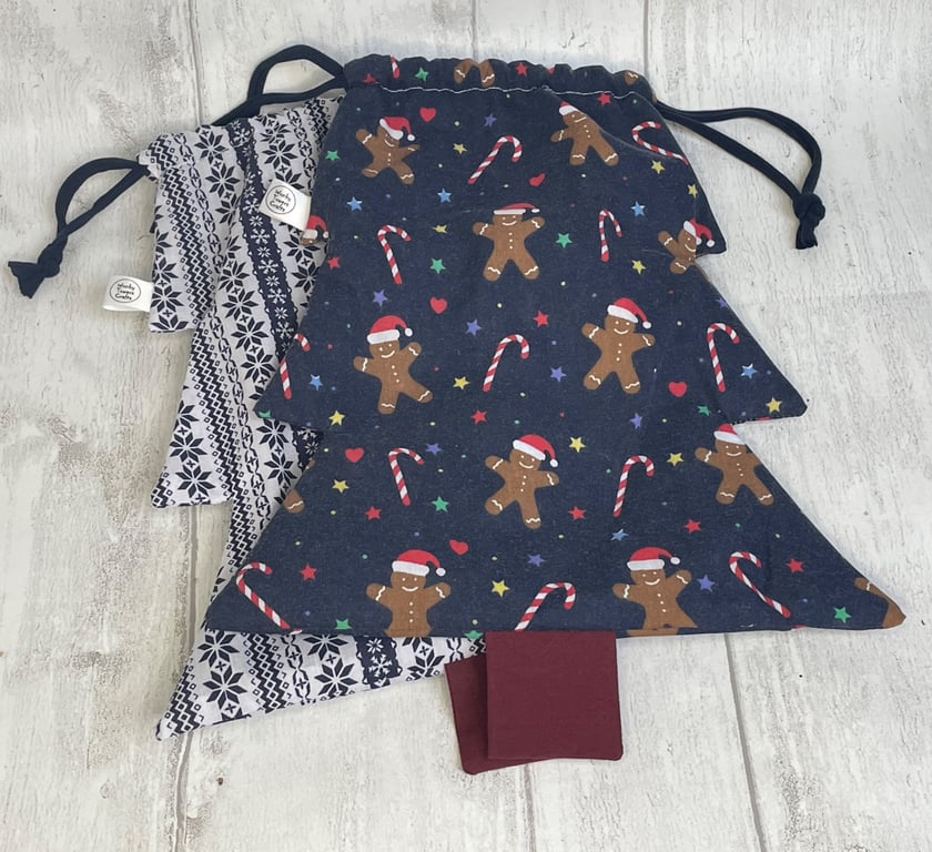 Set of two Christmas tree drawstring, reusable gift bags. Blues
