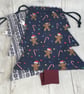 Set of two Christmas tree drawstring, reusable gift bags. Blues