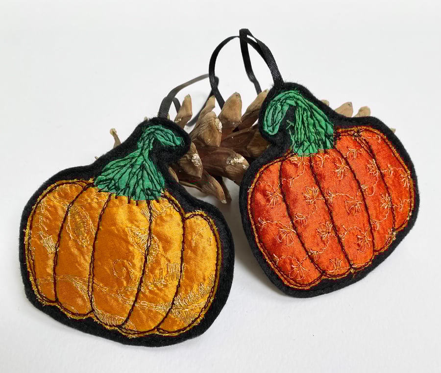 Embroidered up-cycled pumpkin home decoration.
