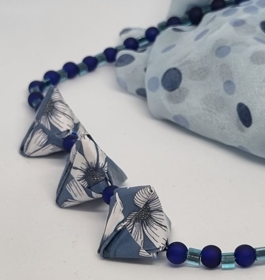 Handmade origami necklace: blue floral paper and small blue beads 