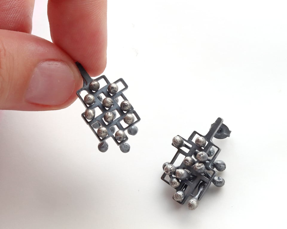 Stud earrings, silver fidget mindful style 1. 