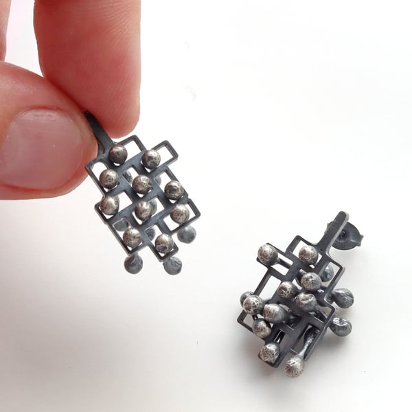 Stud earrings, silver fidget mindful style 1. 