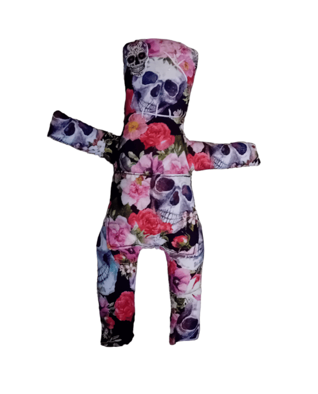 Voodoo style worry doll skulls and roses 