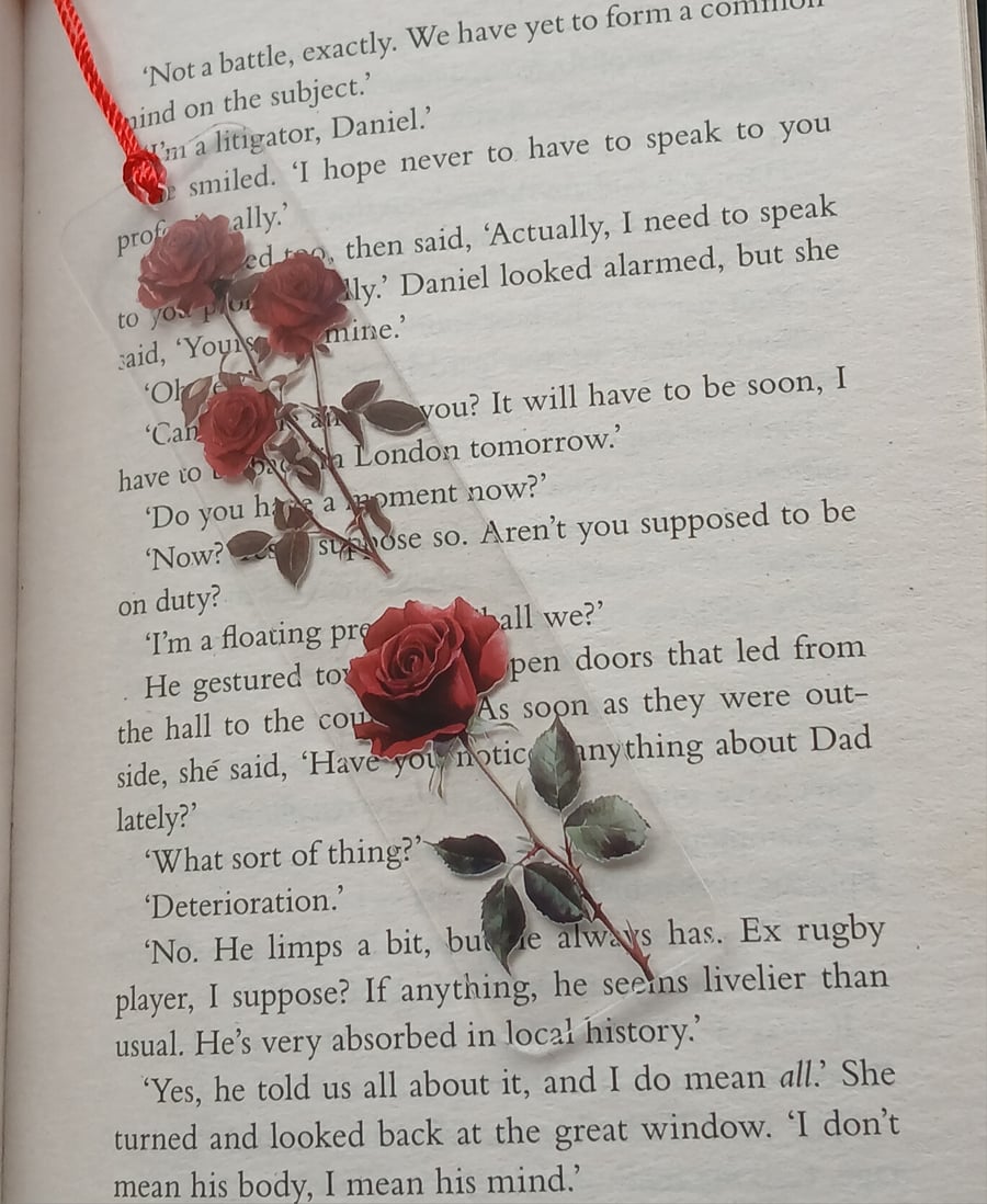 Clear acrylic bookmark decorated with red flowers decals 