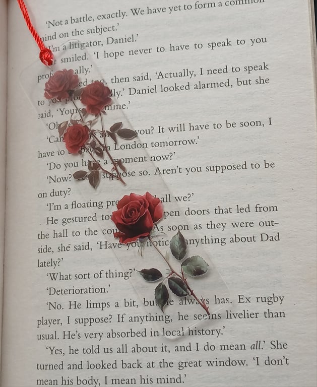 Clear acrylic bookmark decorated with red flowers decals 